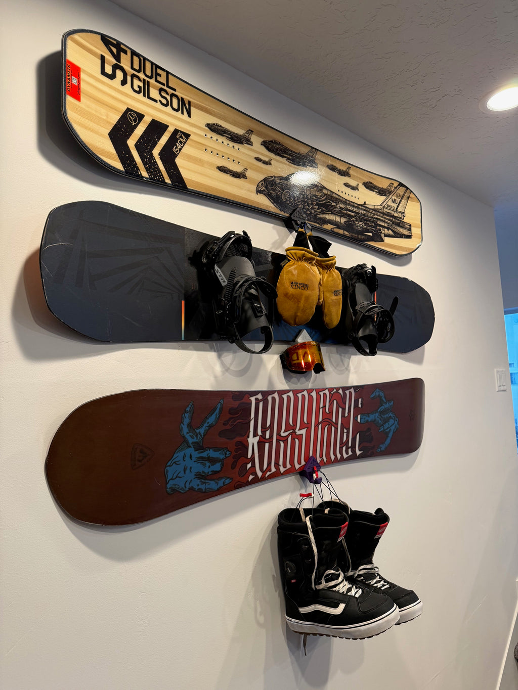 Snowboard wall mount